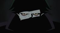 Joker glares forward on Batman: Caped Crusader.