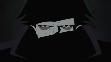 Joker glares forward on Batman: Caped Crusader.