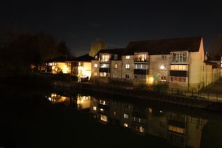 A photo of houses at night taken on a Fujifilm X-M5 mirrorless vlogging camera