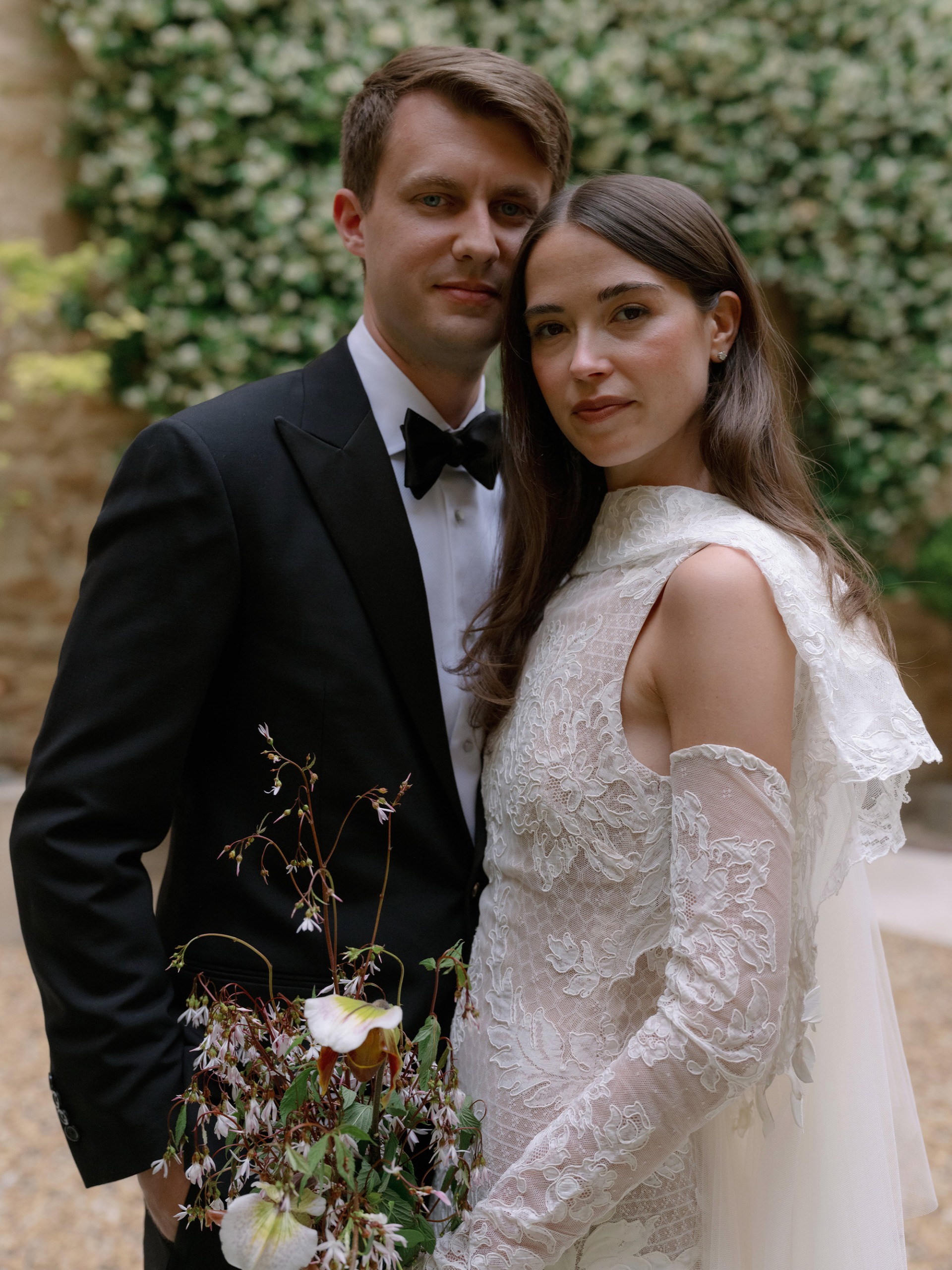 Abbie and Max in their wedding outfits.