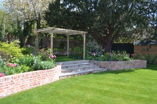 jacksons fencing pergola at top of garden steps
