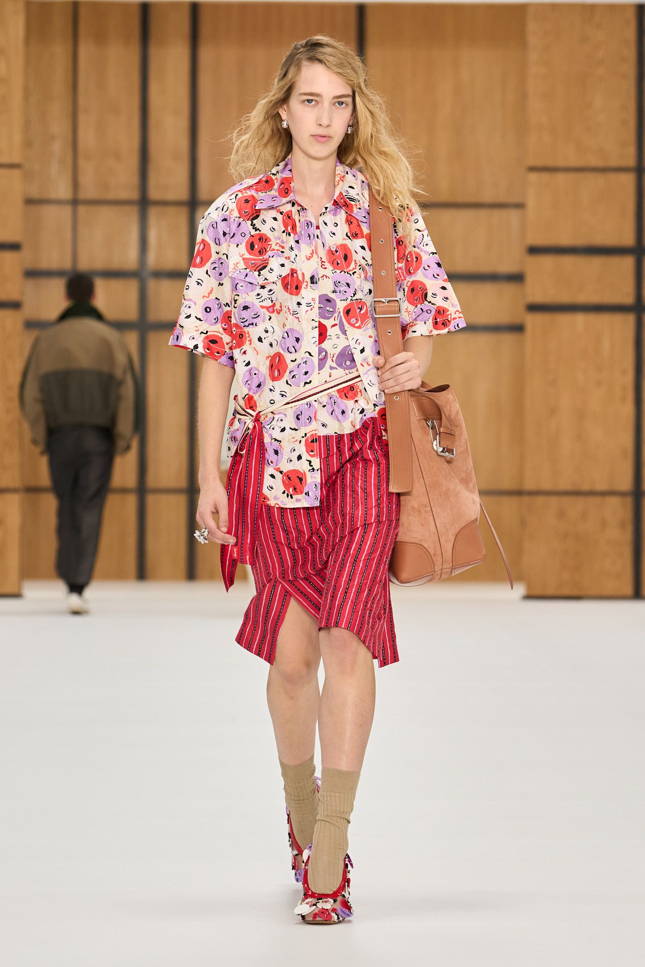 a model walks the burberry spring/summer 2027 runway.