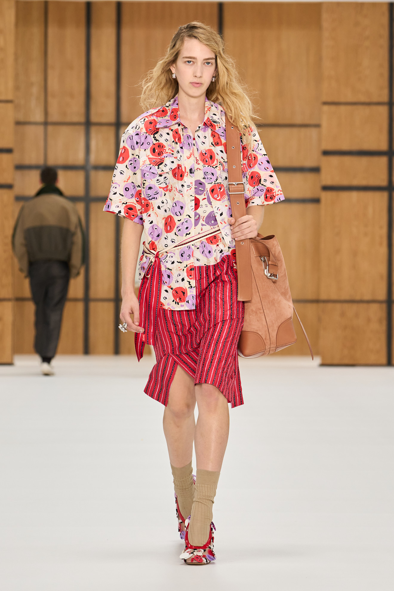 a model walks the burberry spring/summer 2027 runway.