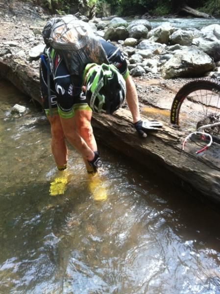 Cleaning up in a river, unfortunately there isn't much time for this mid-race