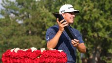 Michael Thorbjornsen holds the Rocket Classic trophy