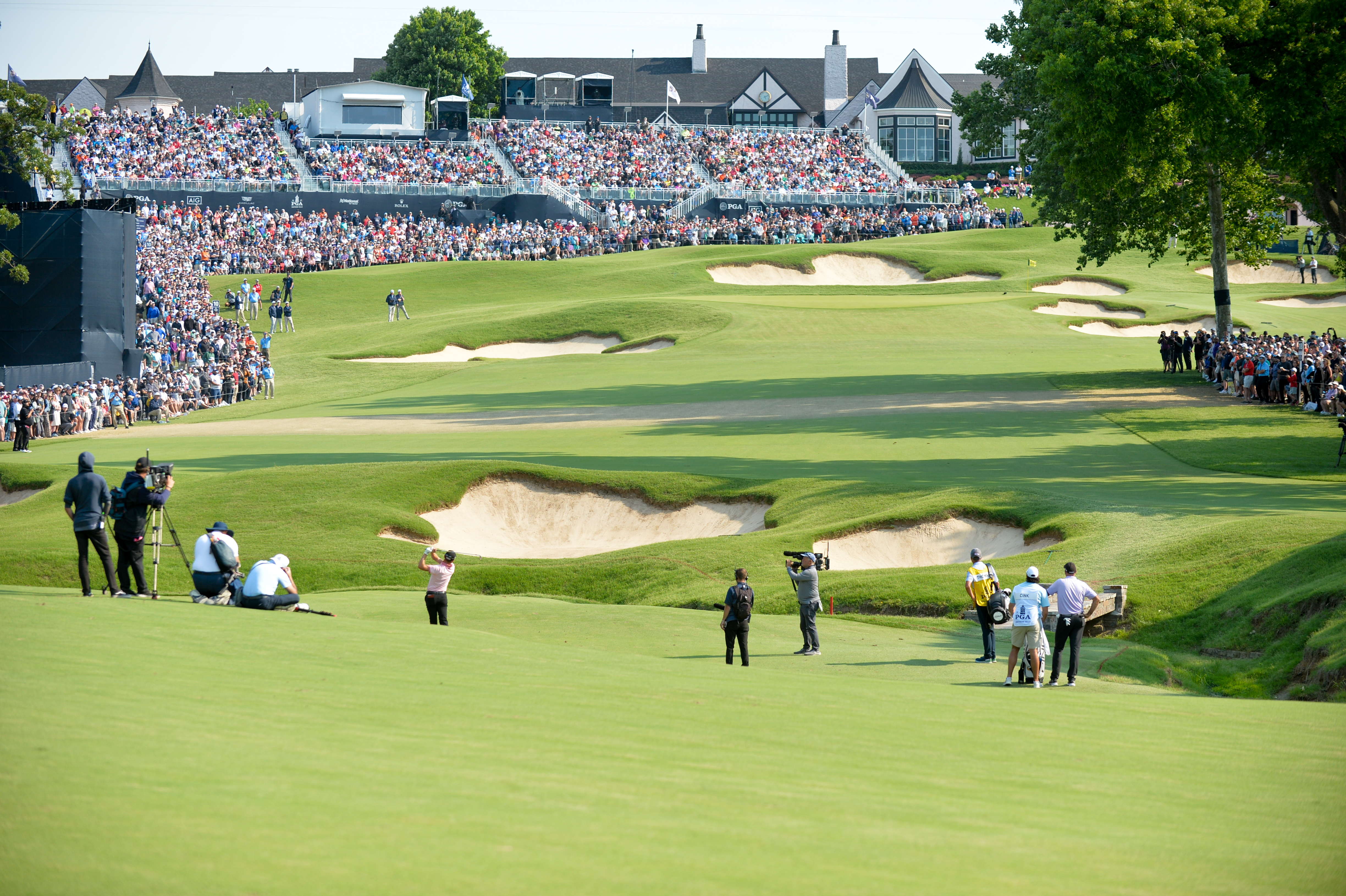 Justin Thomas strikes a shot from the fairway