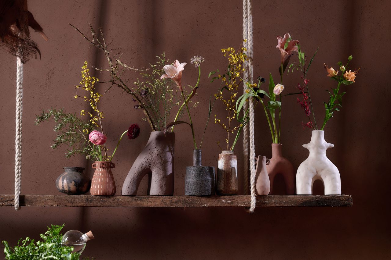 flowers and branches in vases