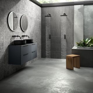 Dark bathroom with an open ceiling and walk-in shower