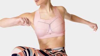 Woman wearing Sweaty Betty Zero Gravity sports bra