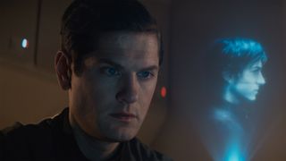 Syril Karn stares at a holo of Cassian Andor in Andor season 1