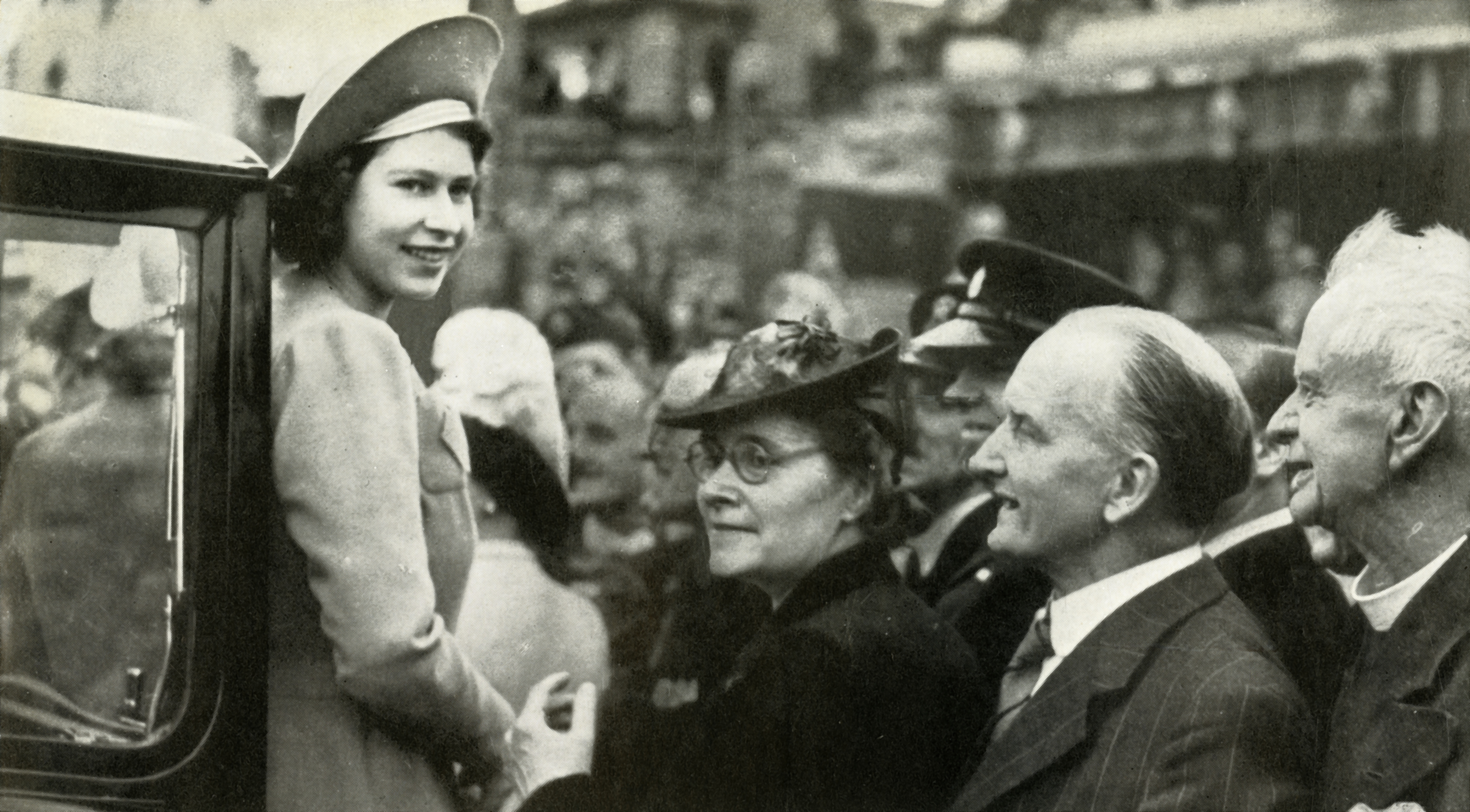 Queen Elizabeth in a crowd on May 9, 1945