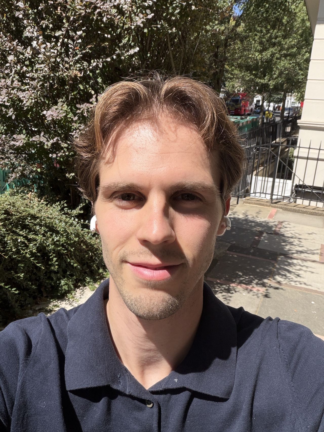 A selfie of a man taken with the iPhone Air