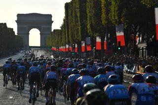 The peloton racing in Paris, stage 21 at the Tour de France