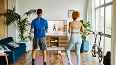 Couple doing a HIIT home workout