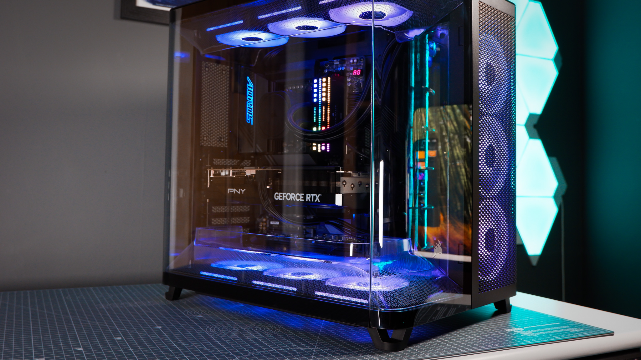 A Corsair Air 5400 PC case on a desk with various parts installed.