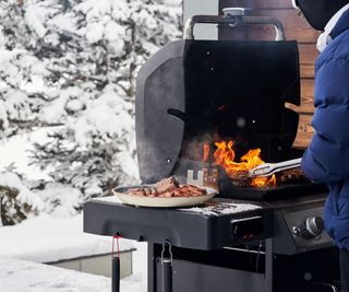 Grilling meat in the snow