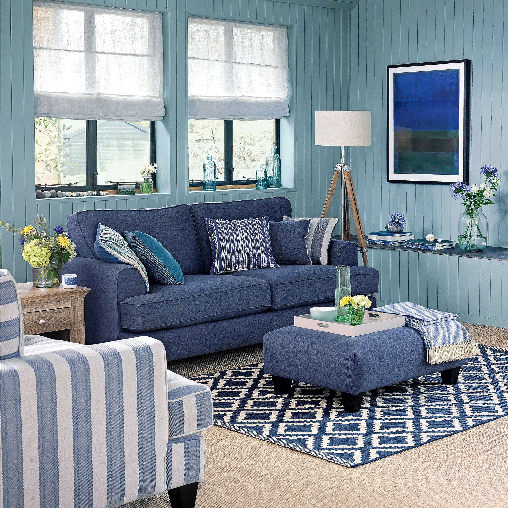 Blue living room with blue sofa