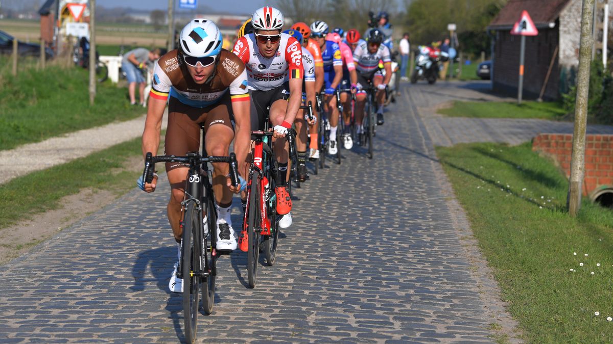 Cyclists ride the cobbles of the E3 Harelbeke to Harelbeke Classic