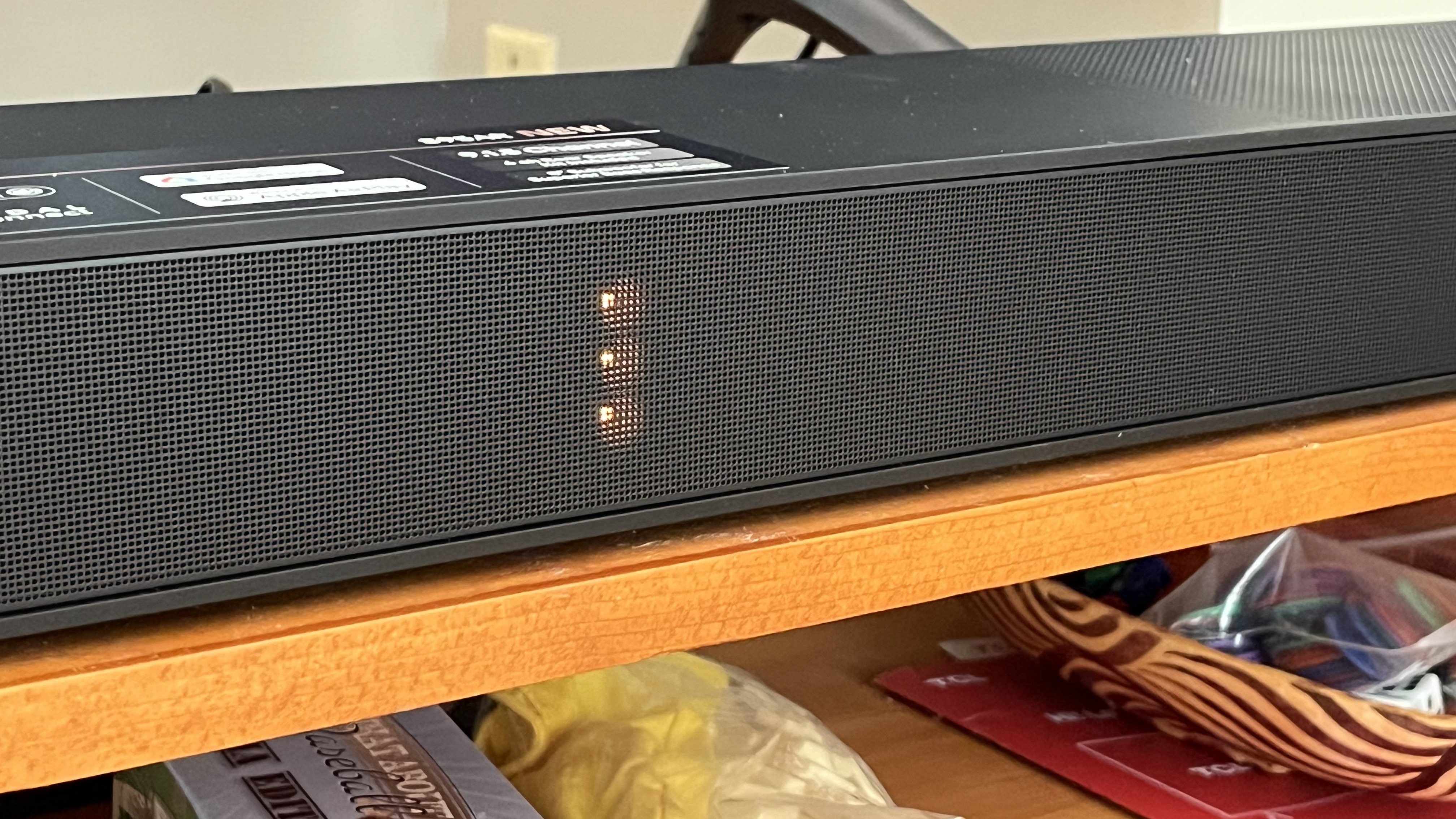 close-up of LG S95AR front panel LED indicator lights