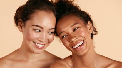 women smiling with glowing skin wearing dewy makeup