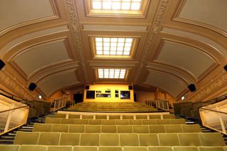 Green cinema seats in Art Deco auditorium