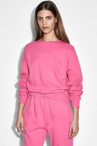 pink crewneck sweatshirt