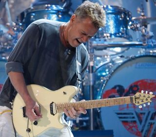 Eddie Van Halen performs onstage with Van Halen in East Rutherford, New Jersey on May 13, 2008