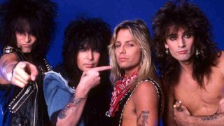 Motley Crue posing for a photograph in 1987