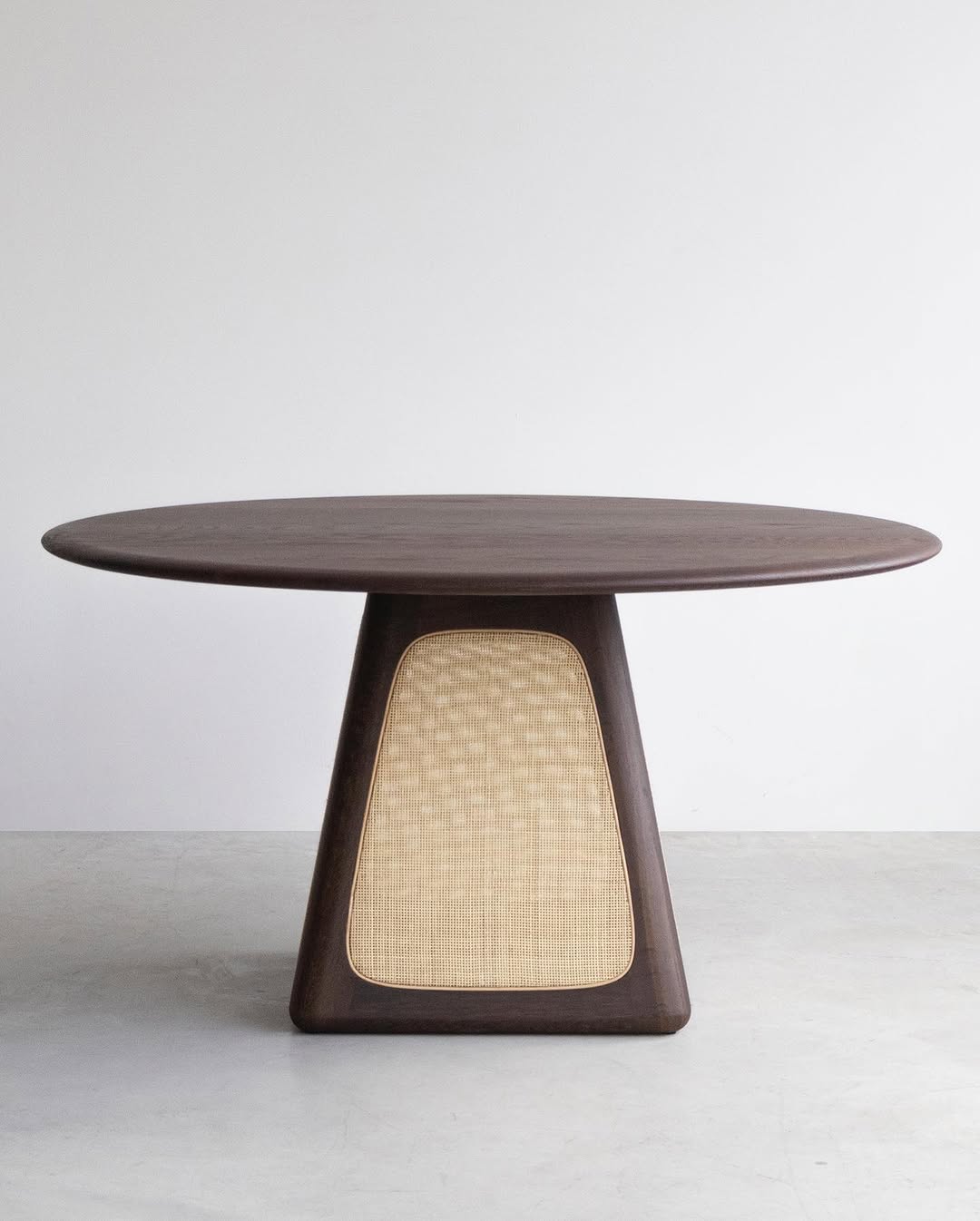 Wood and wicker chair by Gabriel Tan