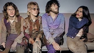 Eric Clapton, Bonnie Bramlett, Delaney Bramlett and George Harrison backstage in 1969