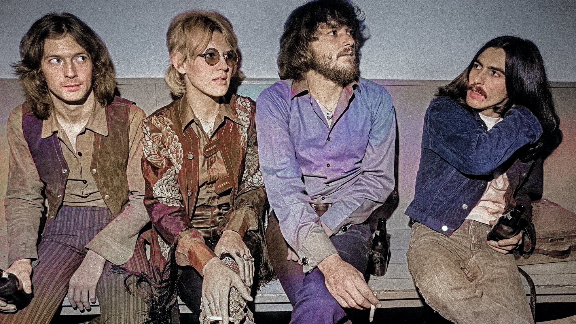 Eric Clapton, Bonnie Bramlett, Delaney Bramlett and George Harrison backstage in 1969