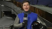 Colin Jost reports amid the 2026 Winter Olympics.
