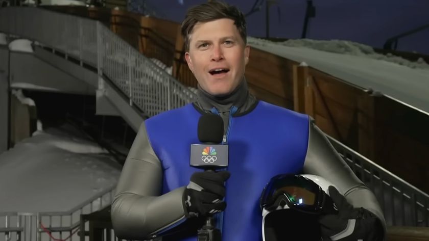 Colin Jost reports amid the 2026 Winter Olympics.
