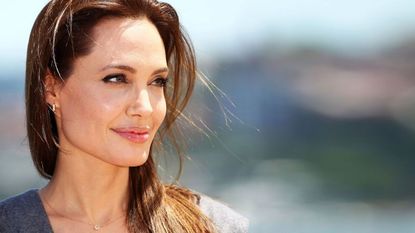 Angelina Jolie smiling side profile