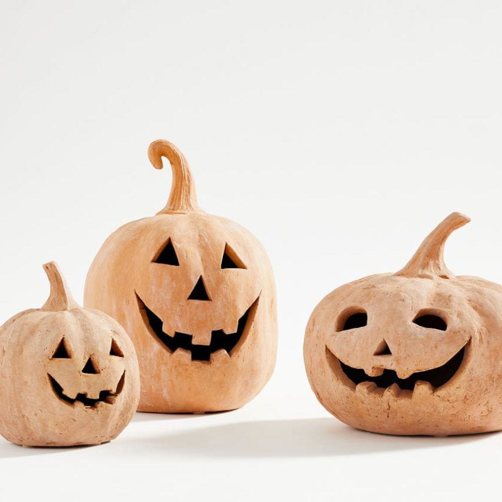 Three terracotta jack-o'-lanterns