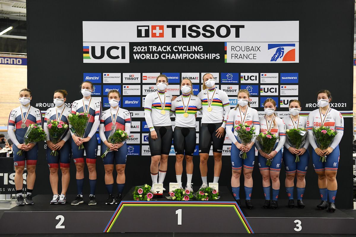 Picture by Simon Wilkinson/SWpix.com - 20/10/2021 - Cycling - Tissot 2021 UCI Track Cycling World Championships - Women&acirc;s Team Sprint Finals - Stab Velodrome, Roubaix, France - Lea Friedrich, Pauline Sophie Grabosch and Emma Hinze of Germany (Gold), Natalia Antonova, Yana Tyshchenko, Daria Shmeleva and Anastasiia Voinova of the Russian Cycling Federation (Silver) and Lauren Bate, Blaine Ridge Davis, Sophie Capewell and Millicent (Milly) Tanner of Great Britain (Bronze) on the women's team sprint podium