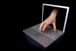 hand through computer