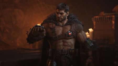 Doom: The Dark Ages - The Doom Slayer without his iconic armour, just a cape and leather, inspecting his right arm. 