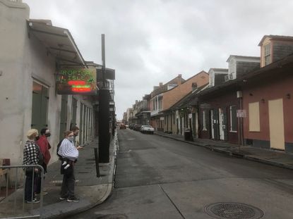 Bars are boarded up in New Orleans ahead of Hurricane Zeta.