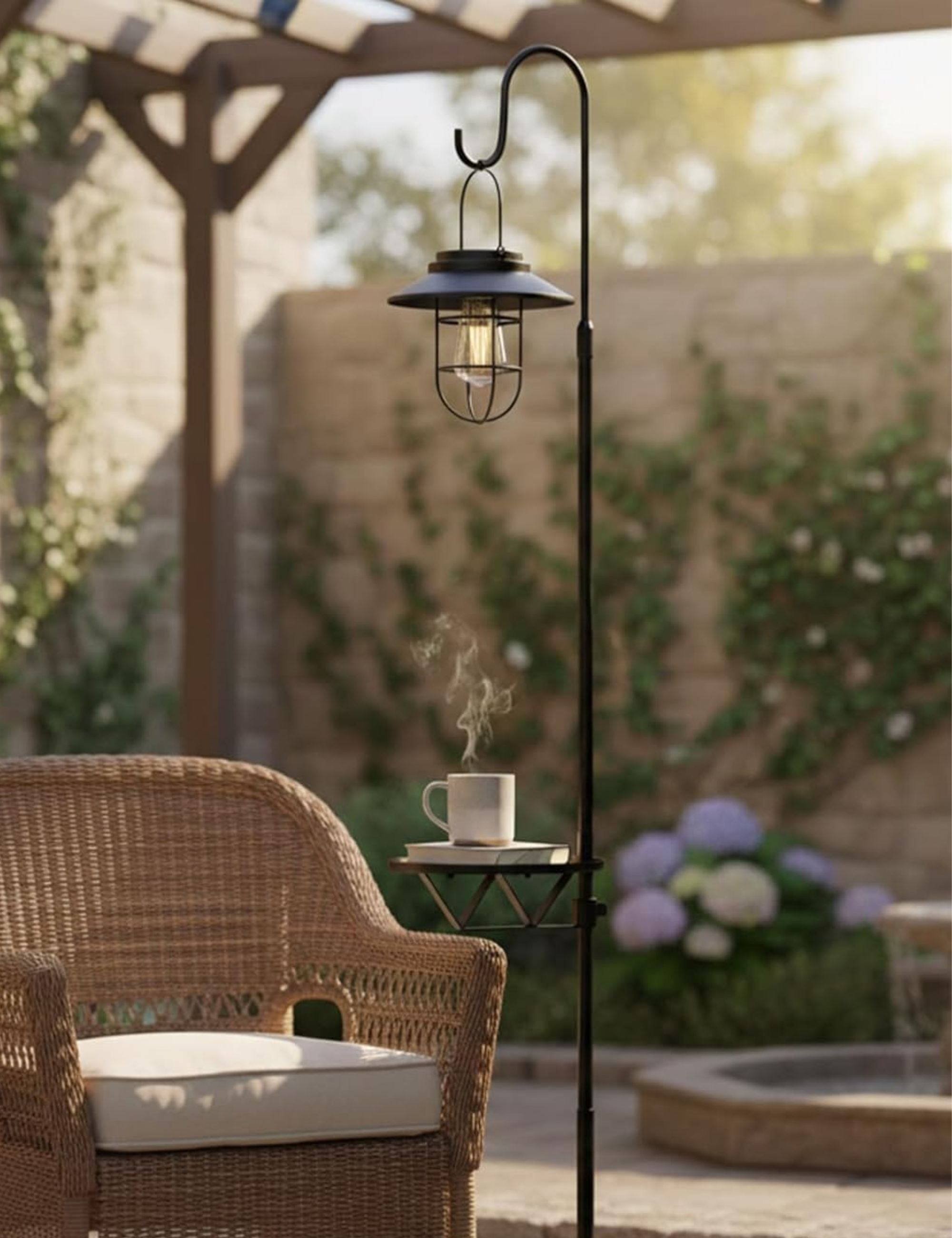 3-in-1 solar outdoor lamp styled alongside a woven patio chair holding a book and coffee mug