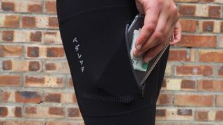 Detail of pocket of Pedaled Odyssey Women's Cargo Bib Tights