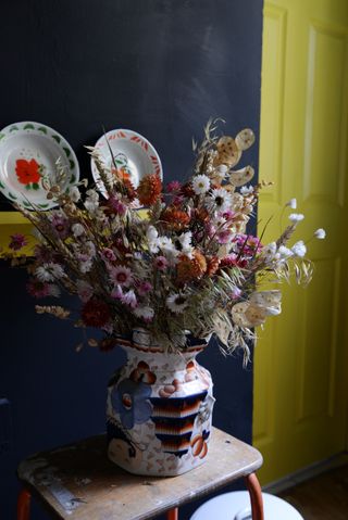 Dot & Dandelion dried flower arrangement in a vintage jug