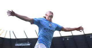 Manchester City star Erling Haaland, target of Barcelona, celebrates after scoring the team's third goal during the Premier League match between Manchester City and Leicester City at Etihad Stadium on April 15, 2023 in Manchester, England.