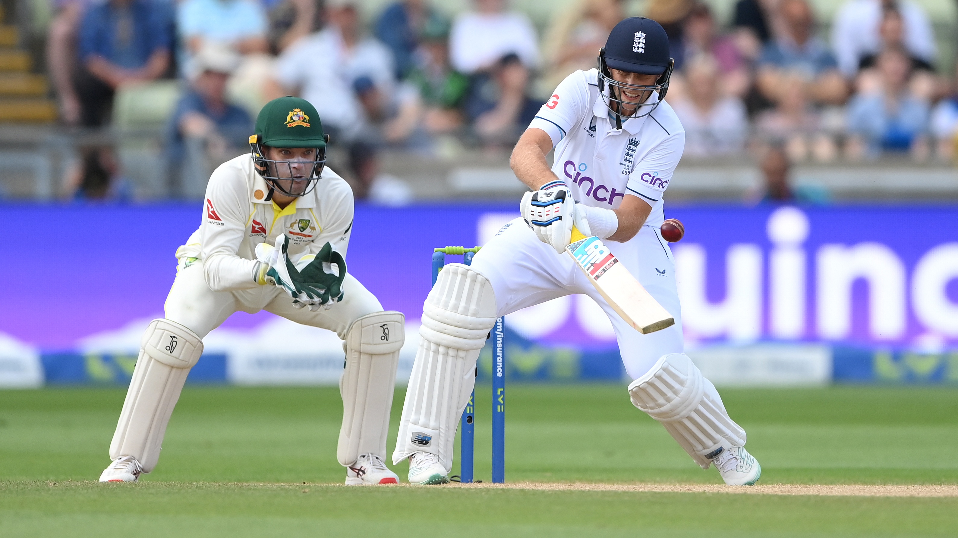 England batsman Joe Root reverse ramps a ball for 6 runs watched by Australia wicketkeeper Alex Carey during day four of the LV= Insurance Ashes 1st Test Match between England and Australia at Edgbaston on June 19, 2023 in Birmingham, England. 