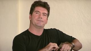 Simon Cowell looking displeased during an audition in American Idol.