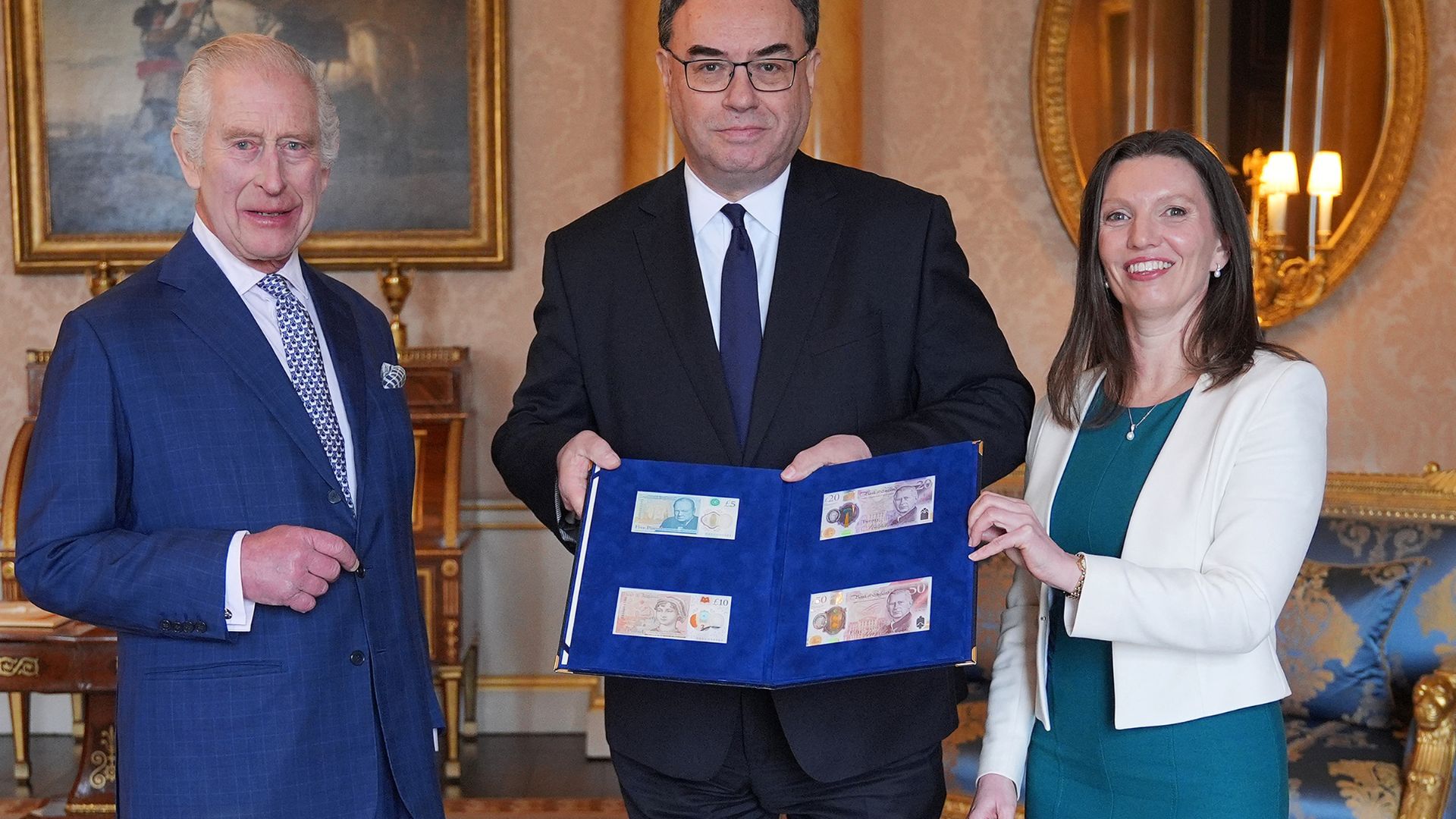 King Charles with members of the Royal Mint and his bank notes