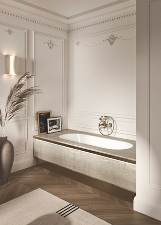 a luxurious built in bathtub in a room with paneled walls