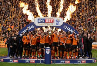 Wolverhampton Wanderers celebrate winning the Sky Bet Championship after the Sky Bet Championship match between Wolverhampton Wanderers and Sheffield Wednesday at Molineux on April 28, 2018 in Wolverhampton, England. (Photo by Richard Heathcote/Getty Images)