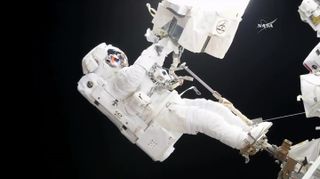 During a spacewalk on Oct. 20, NASA astronaut Joe Acaba worked on the new latching end effector at the Canadarm2 robotic arm outside the International Space Station.