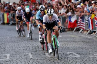 PARIS FRANCE AUGUST 04 LR Lotte Kopecky of Team Belgium and Kristen Faulkner of Team United States compete in the breakaway during the Womens Road Race on day nine of the Olympic Games Paris 2024 at Trocadero on August 04 2024 in Paris France Photo by Alex BroadwayGetty Images